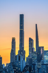 The skyline of Midtown Manhattan in New York before sunrise with the pencil towers of  Billionaires Row