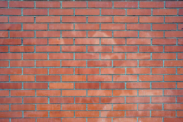 Background made of an ordinary red brick wall