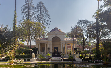  Garden of Dreams with Serene Pond and Architecture