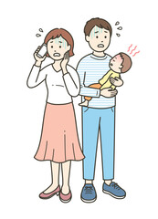 急な発熱をした子供を抱いて焦る若い父親と医療機関に電話する母親
