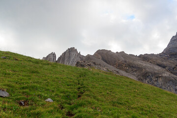 Ascent with hiking footpath towards mountain Col des Chamois in Swiss Alps, Switzerland