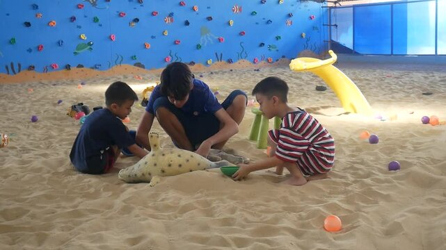 Children playing in the sand at the playground
