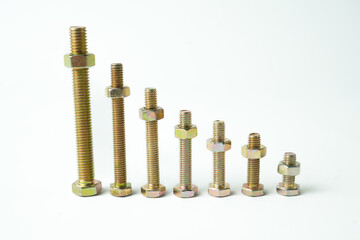 Metal bolts and nuts symmetrically arranged on a white background, representing precision, strength, and industrial engineering concepts.