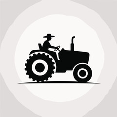 Obraz premium Farmer drives a tractor on his land in silhouette. Agricultural work, farming, rural lifestyle, agriculture industry