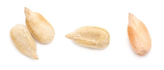 Set of peeled sunflower seeds on white background
