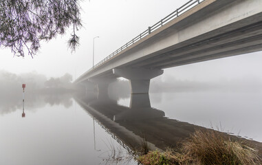 The Shelley Bridge on the Canning River in Perth Western Australia, during a very foggy morning.
