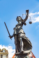 historic Lady justice at the fountain of the central market square in Frankfurt,