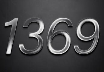 Chrome metal 3D number design of 1369 on grey background.
