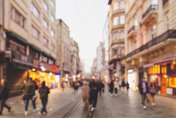 abstract   blur background, unrecognizable people walking in the city centre