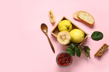 Jar of sweet jam, quince fruits and bread pieces on pink background
