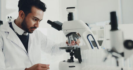 Man, scientist and sample with microscope in lab for research, medical study and gene analysis. Male person, machine and particles with solution, dna production and confidence of vaccine breakthrough