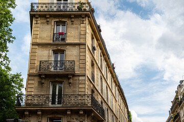 Parisian Building Exterior with Balconies and Windows