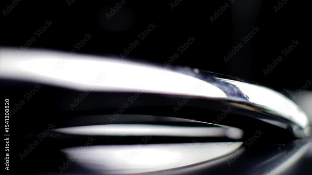 Poster abstract metallic object with dramatic lighting and surface reflection