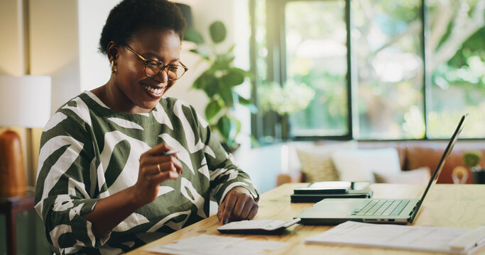 Happy, black woman and finance with laptop for payroll, tax return or budget planning at home. Female person, accounting or smile with calculator, documents or bills for expenses, deductions or audit - Powered by Adobe