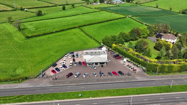 Aerial view of McCartney Motors Larne Car sales Kilwaughter on A8 Larne road Dual carriageway, Belfast road, Millbrook Larne Co Antrim Northern Ireland 06-06-25