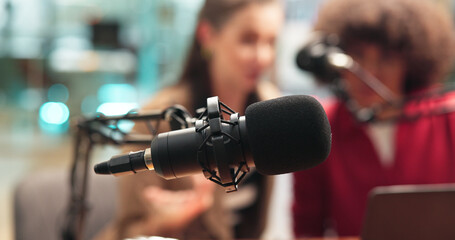Talking, mic and people in studio for podcast, interview and discussion for content creation....