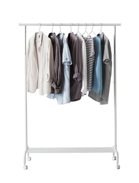 Collection of stylish clothes hanging on clothes hanger isolated in transparent PNG, Clothing rack - isolated design element, Minimalist fashion blog. 
