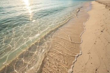 Peaceful Tropical Beach with Clear Water at Sunset. Tranquil shoreline with gentle waves, clear turquoise water, and golden sand reflecting sunset light, evoking relaxation and serenity