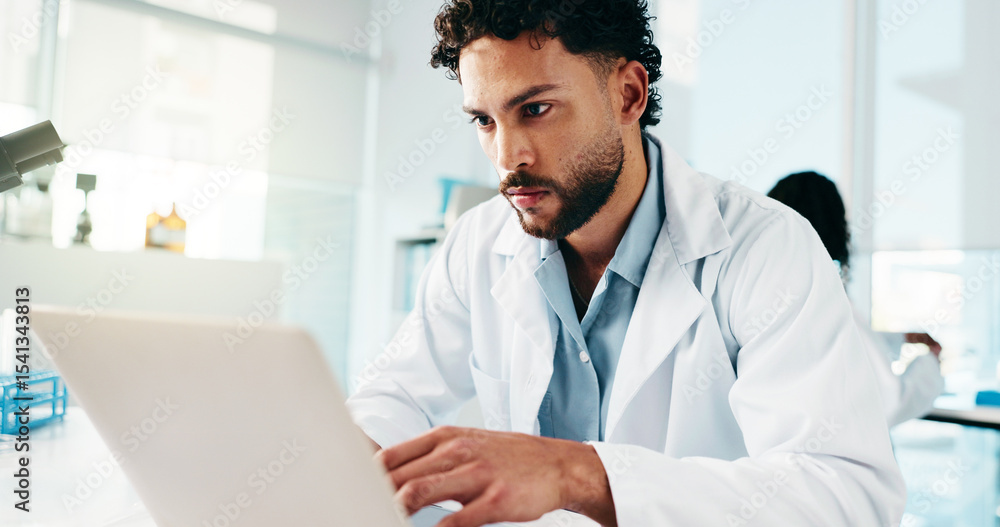 Poster man, scientist and typing on laptop in lab for research, reading study and medical experiment. serio