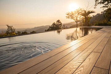 Infinity pool at sunrise with scenic mountain view. Peaceful infinity pool beside wooden deck overlooking mountains and trees at sunrise, ideal for travel, wellness, or resort imagery