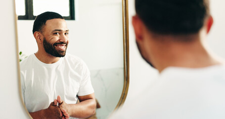 Mirror, beauty and reflection with man in bathroom for skincare, grooming or cosmetics. Morning...