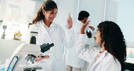 Science, people and high five with tablet in lab for experiment success, study solution or goals....
