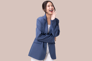 Portrait of happy young business woman posing open mouth isolated on brown background.