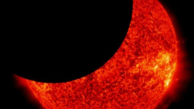 View of a solar eclipse with the moon obscuring the sun's bright surface.