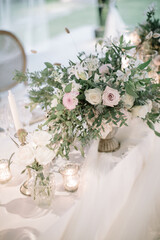 lovely Table setting for magnificent composition from flowers at a wedding