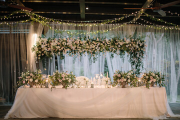 lovely Table setting for magnificent composition from flowers at a wedding