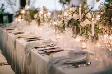 lovely Table setting for magnificent composition from flowers at a wedding