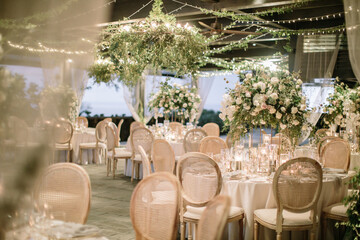 lovely Table setting for magnificent composition from flowers at a wedding