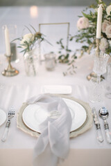 lovely Table setting for magnificent composition from flowers at a wedding