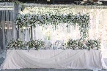 lovely Table setting for magnificent composition from flowers at a wedding