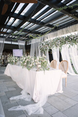 lovely Table setting for magnificent composition from flowers at a wedding