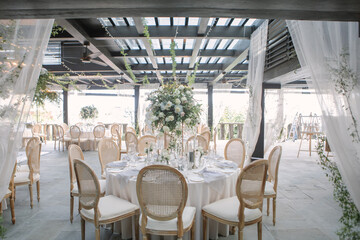 lovely Table setting for magnificent composition from flowers at a wedding