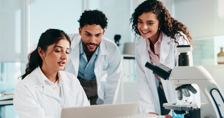Laptop, medical and teamwork with people in laboratory for science, gene therapy and research....