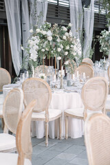 lovely Table setting for magnificent composition from flowers at a wedding