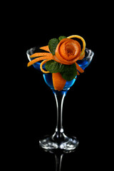 Art in orange- fruits carving. How to make to citrus garnish design for a drink. 