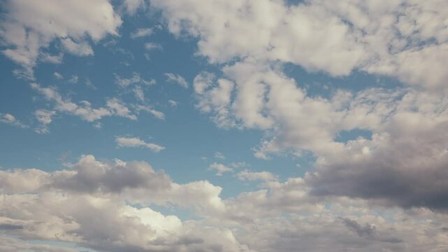 A Serene and Tranquil Cloudy Sky with Soft and Beautiful Blue Hues Filling the Atmosphere