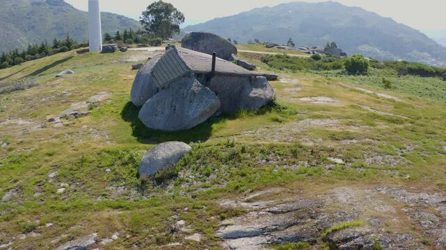 Aerial view of the unique Penedo boulder house in the Portuguese mountains.