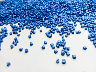 Blue polymer granules, blue masterbatch granules, cold cutting material type, isolated on white...