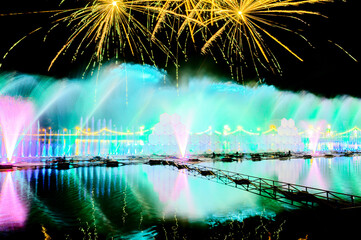 Chiang Mai Series : Dancing fountain and fireworks show in the lake at Chiangmai. Festive atmosphere and beautiful lights during Christmas celebration. Celebrations during the New Year Festival.