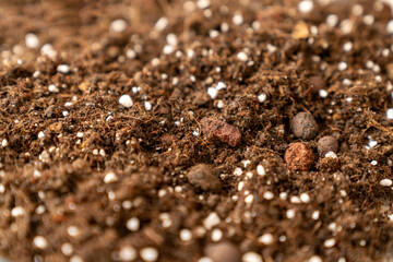 rich organic potting soil with perlite and clay pebbles, perfect for gardening, plant growth,...