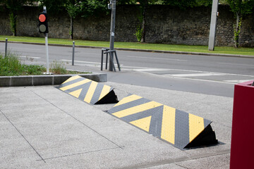 two raisable road blockers vehicle enter black yellow for preventing of cars access area
