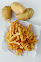 Delicious Golden Crinkle-Cut French Fries Served with Fresh Potatoes