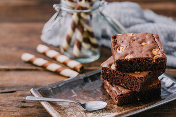 Delicious Chocolate Brownies with Nuts on Rustic Wooden Table