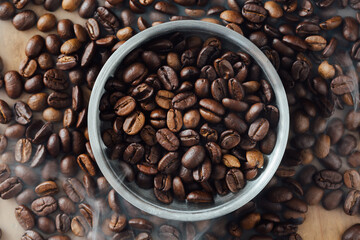 Fresh Coffee Beans in Bowl Surrounded by Coffee Beans Background