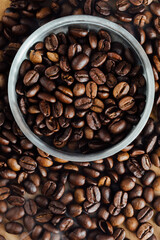 Freshly Roasted Coffee Beans in Bowl Surrounded by More Beans