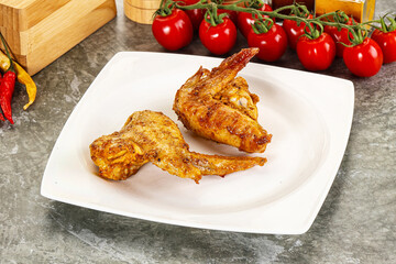 Tasty roasted chicken wing with spices